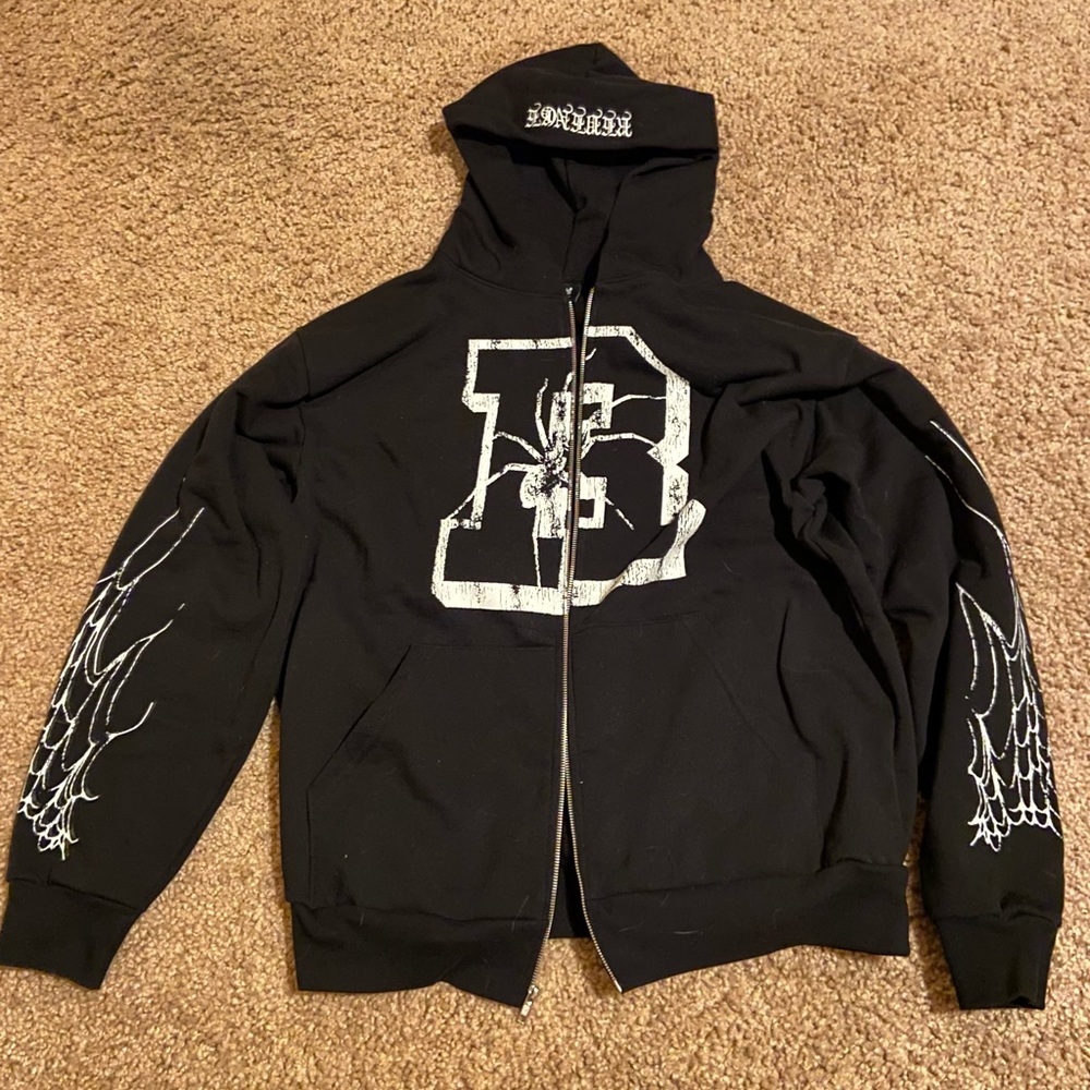 Black zip up Revenge HALLOWEEN DROP
spider webs on sleeve Large